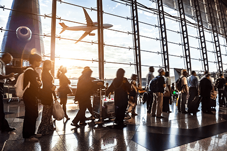 The top 5 reasons to come to Canada in 2018 busy airport with waiting passengers