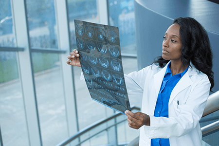 https://canadianvisa.org/blog/jobs/work-in-canada-top-7-seven-jobs-in-2018 Female nurse looking at x-ray of a patient
