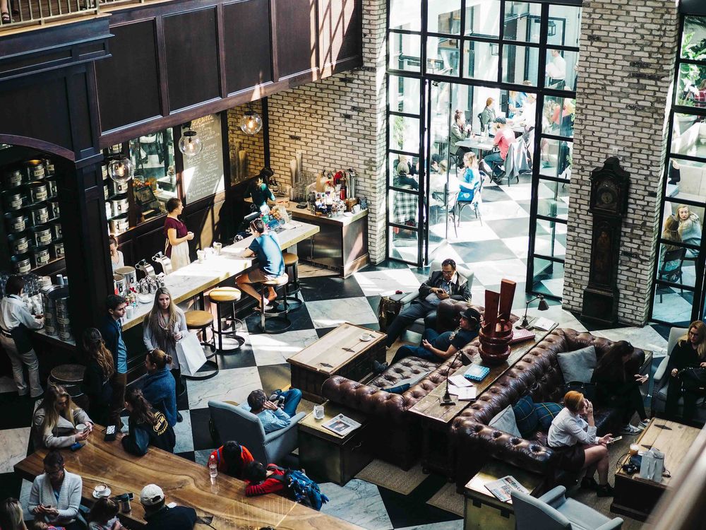 https://canadianvisa.org/blog/cities-and-places/victoria-bc/10-fun-facts-about-victoria busy restaurant serving meals and coffee