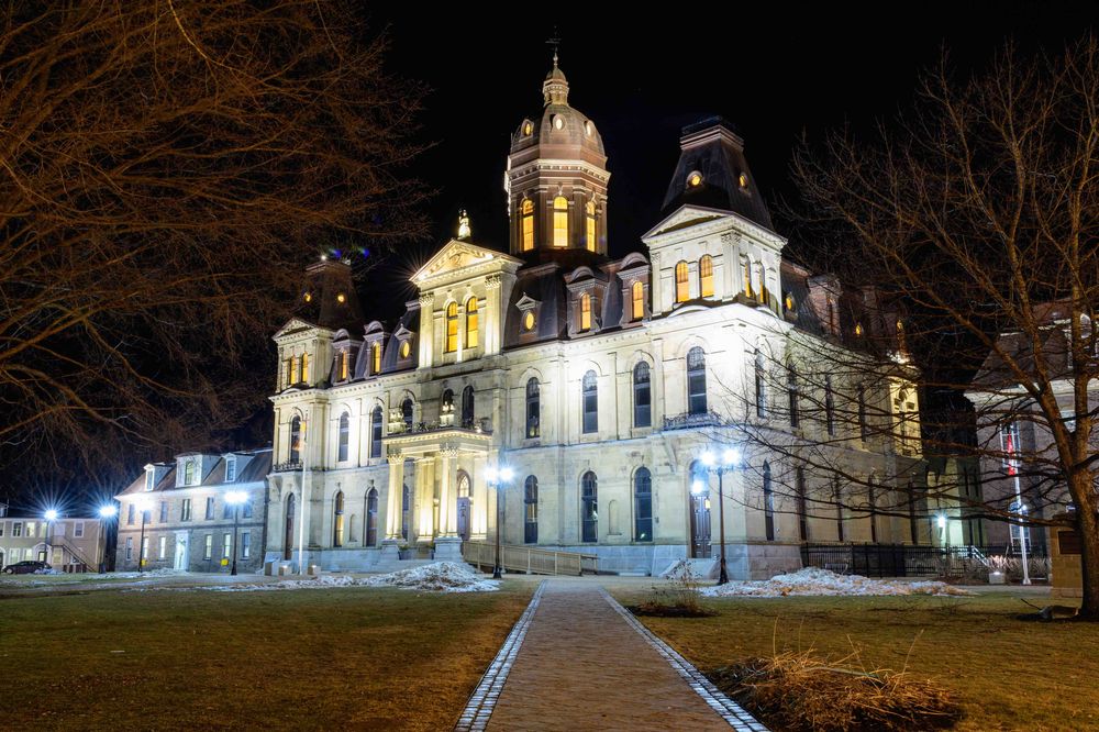 The New Brunswick Legislative Assembly building at night. Photo by Jason Jeandron.