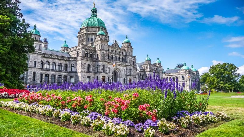 How the US Elections 2020 Will Affect Canadian Immigration Beautiful-view-of-historic-parliament-building-with-colorful-flowers-on-Vancouver Island-British Columbia-Canada | US Elections 2020 | Canadian Immigration