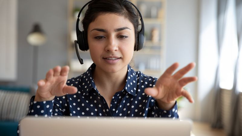 Do I Need a Canadian Work Visa to Teach Online Young woman conducting online teaching in Canada