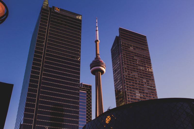 Beat the Blues: Work in Canada for High Job Satisfaction Toronto skyline | Tips on how to work in Canada