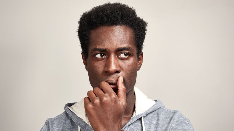 Thoughtful-african-guy-thinking-try-solve-problem | Mistakes to Avoid When Applying to Immigrate to Canada